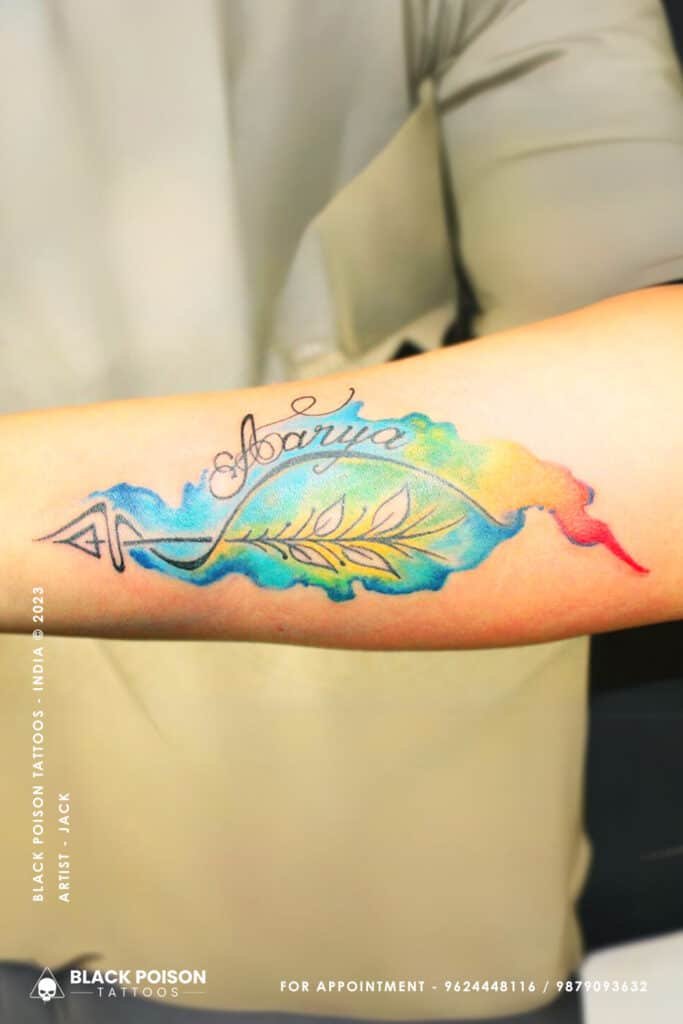 A Watercolor Flight: Unveiling the Beauty of the Arrow and Name "Aarya" Tattoo