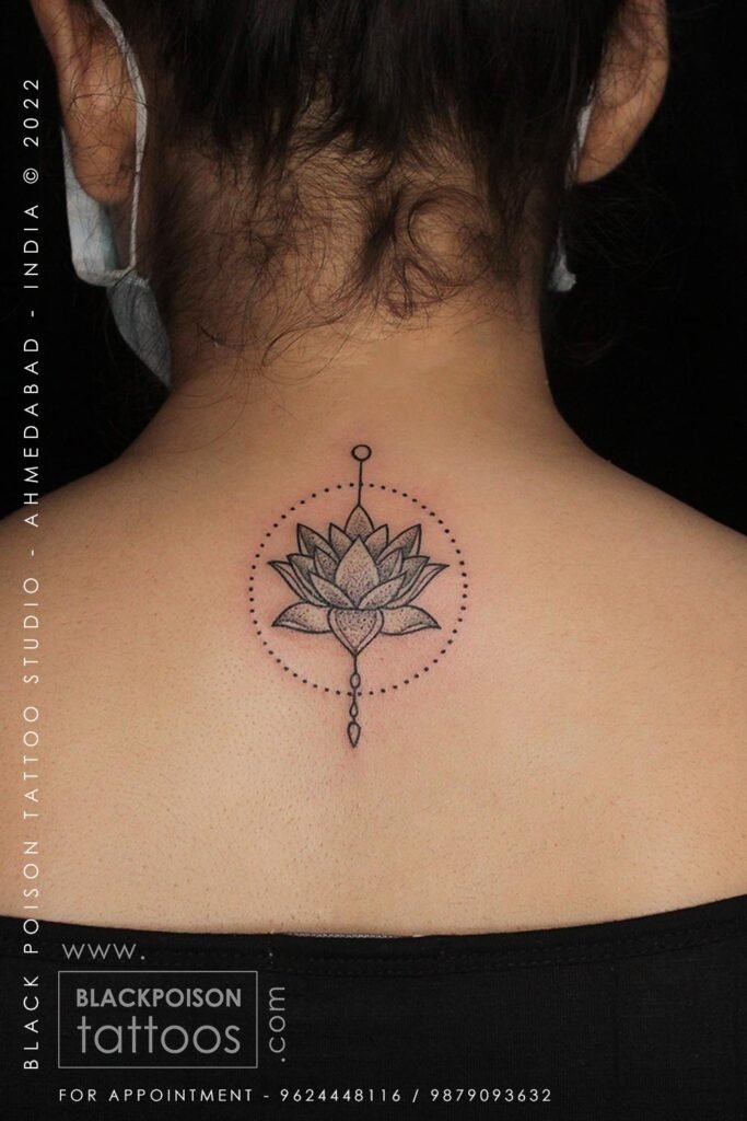 A Lotus Tattoo on a Girl's Back