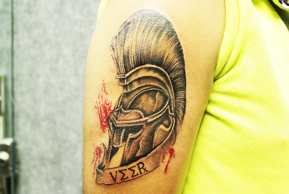 Ancient Greek Warrior Helmet Tattoo - Inked By Black Poison Tattoos