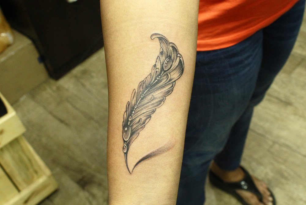 Beautiful Simple & Subtle Feather Tattoo - Inked By Black Poison Tattoos